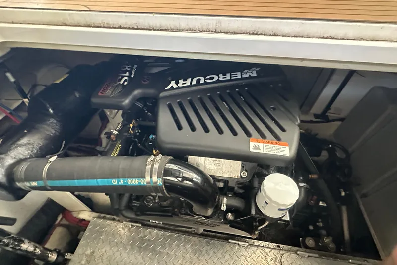  Yacht Photos Pics Engine compartment of 2006 Four Winns 378 Vista with Mercury engine visible.