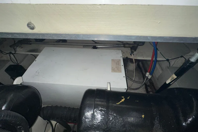  Yacht Photos Pics Engine compartment of a 2006 Four Winns 378 Vista boat, showing mechanical components.