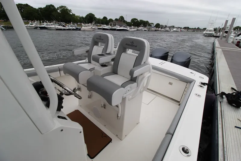 Dojo Yacht Photos Pics 2020 Regulator 28 boat with dual seats docked at marina.