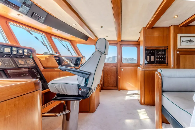 Yosma Yacht Photos Pics Luxurious 2013 Motor Yacht interior with modern helm and plush seating.