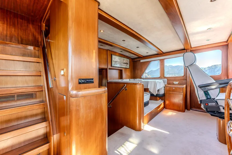 Yosma Yacht Photos Pics Luxurious 2013 Motor Yacht interior with wooden finishes and panoramic windows.