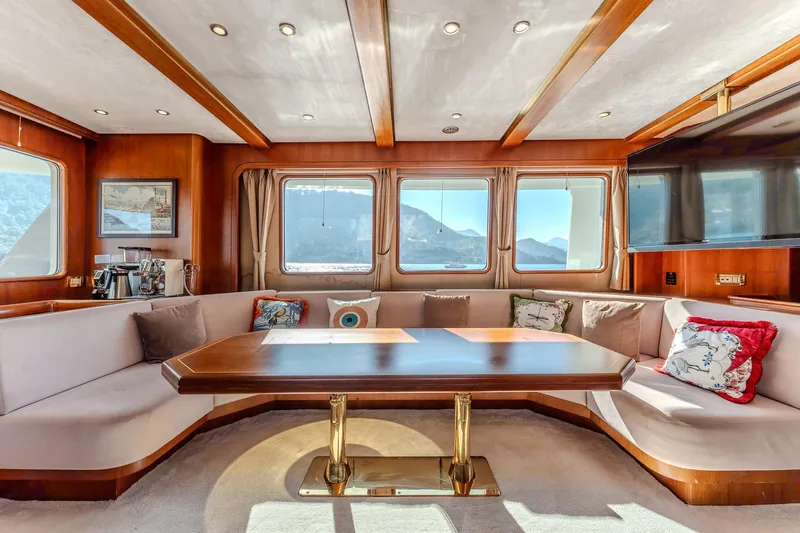 Yosma Yacht Photos Pics Luxurious 2013 Motor Yacht interior with elegant seating and panoramic windows.