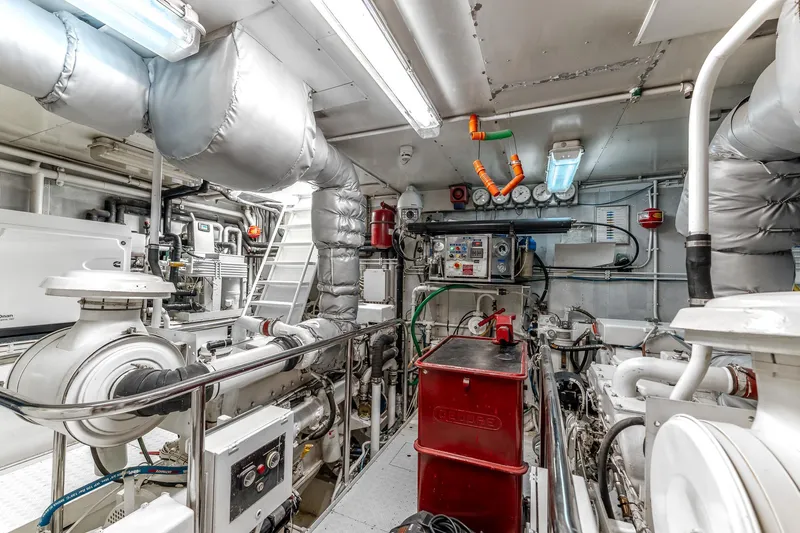 Yosma Yacht Photos Pics Engine room of a 2013 71' motor yacht, featuring advanced machinery and equipment.