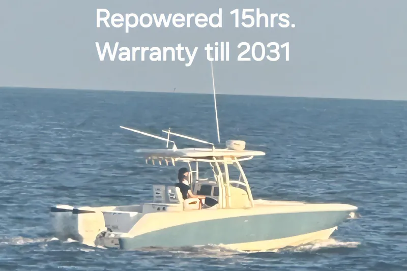  Yacht Photos Pics 2004 Boston Whaler 320 Outrage boat on water, repowered, warranty until 2031.