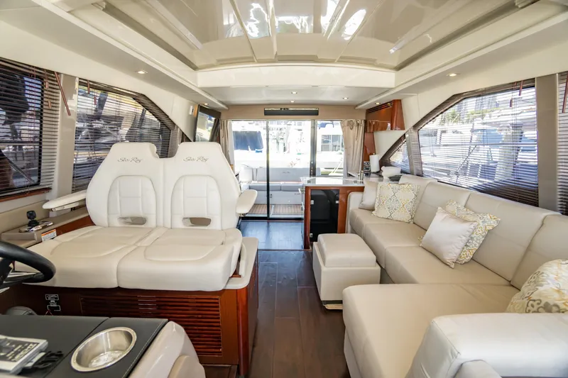  Yacht Photos Pics Luxurious interior of 2017 Sea Ray Sundancer 460 yacht with plush seating and modern design.