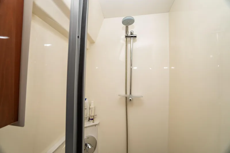  Yacht Photos Pics Shower area in 2017 Sea Ray Sundancer 460 yacht, featuring modern fixtures.