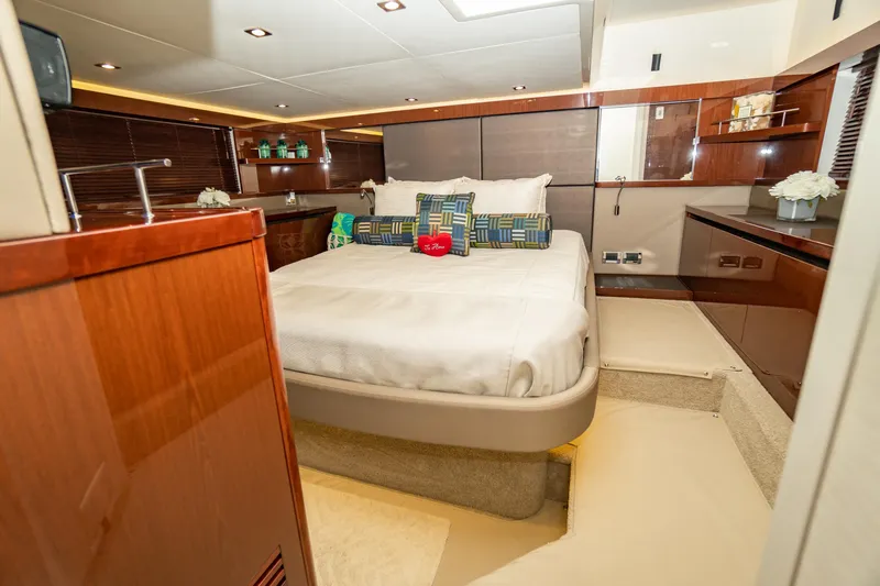  Yacht Photos Pics Luxurious 2017 Sea Ray Sundancer 460 yacht bedroom with elegant wood finishes and plush bedding.