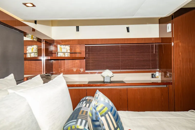  Yacht Photos Pics Luxurious interior of 2017 Sea Ray Sundancer 460 yacht with elegant wood finishes.