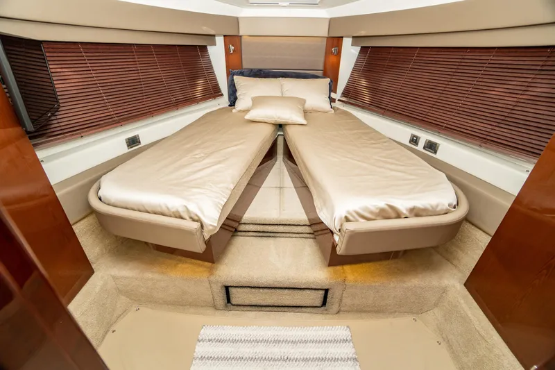 Yacht Photos Pics Luxurious 2017 Sea Ray Sundancer 460 cabin with twin beds and elegant wood accents.