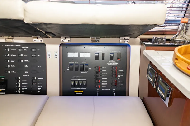  Yacht Photos Pics Control panel inside 2017 Sea Ray Sundancer 460 yacht, featuring switches and gauges.