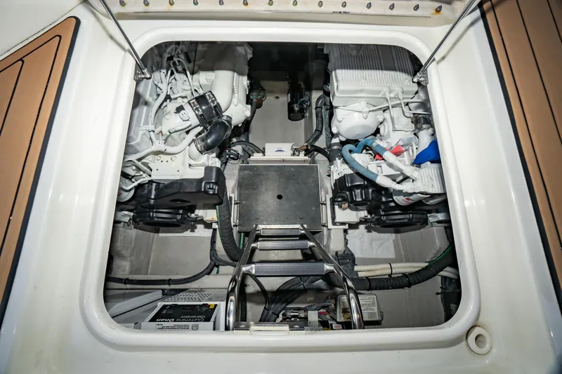  Yacht Photos Pics Engine compartment of a 2017 Sea Ray Sundancer 460 yacht, showcasing mechanical components.