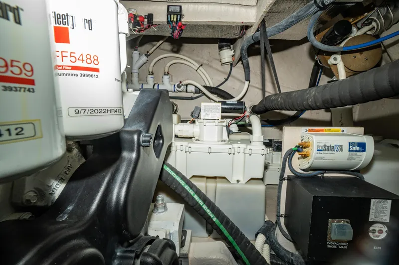  Yacht Photos Pics Engine room of 2017 Sea Ray Sundancer 460, showcasing mechanical components and wiring.