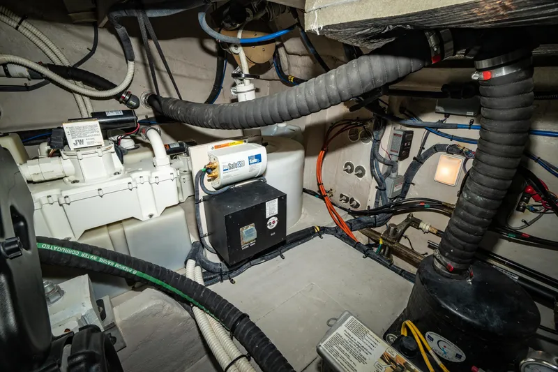  Yacht Photos Pics Engine room of 2017 Sea Ray Sundancer 460, showcasing mechanical components and wiring.