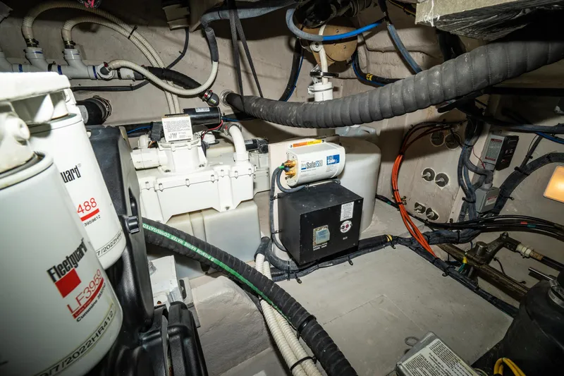  Yacht Photos Pics Engine room of 2017 Sea Ray Sundancer 460 with various mechanical components and wiring.