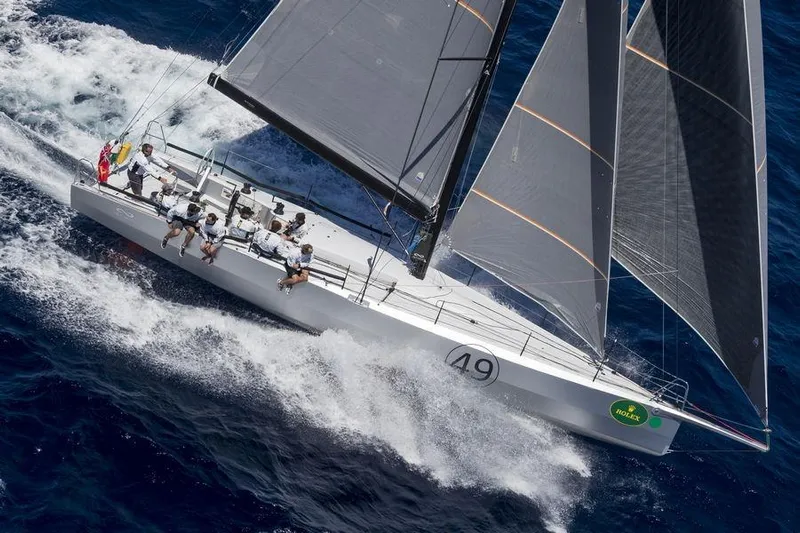 Maverick Yacht Photos Pics Sailing yacht Infiniti 46, 2015 model, racing on open sea with crew onboard.