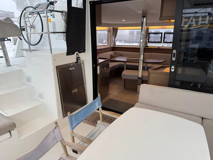 Catalina Breeze Yacht Photos Pics Lagoon 42 catamaran interior, 2022 model, featuring a cozy dining area and modern design.