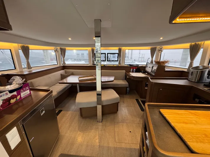 Catalina Breeze Yacht Photos Pics Interior of 2022 Lagoon 42 catamaran with modern kitchen and dining area.