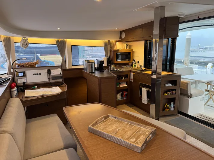 Catalina Breeze Yacht Photos Pics Interior of 2022 Lagoon 42 catamaran with modern kitchen and dining area.