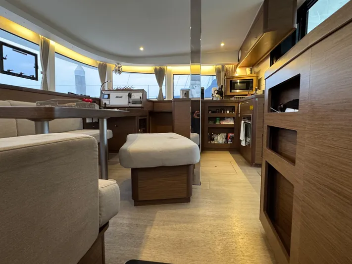 Catalina Breeze Yacht Photos Pics Interior of 2022 Lagoon 42 yacht, featuring modern design and cozy seating area.