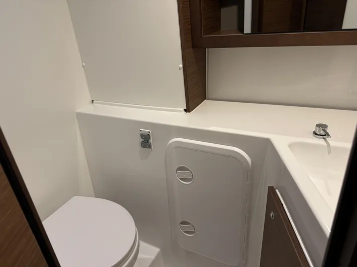 Catalina Breeze Yacht Photos Pics 2022 Lagoon 42 yacht bathroom with modern fixtures and sleek design.