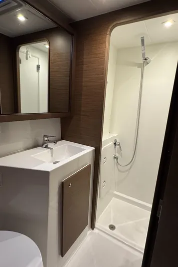 Catalina Breeze Yacht Photos Pics Modern bathroom in 2022 Lagoon 42 yacht with shower and sink.