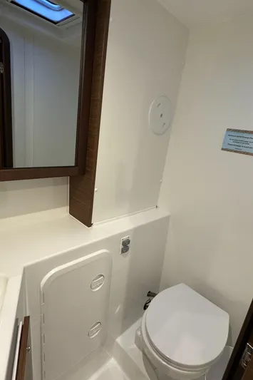 Catalina Breeze Yacht Photos Pics 2022 Lagoon 42 yacht bathroom with modern fixtures and compact design.