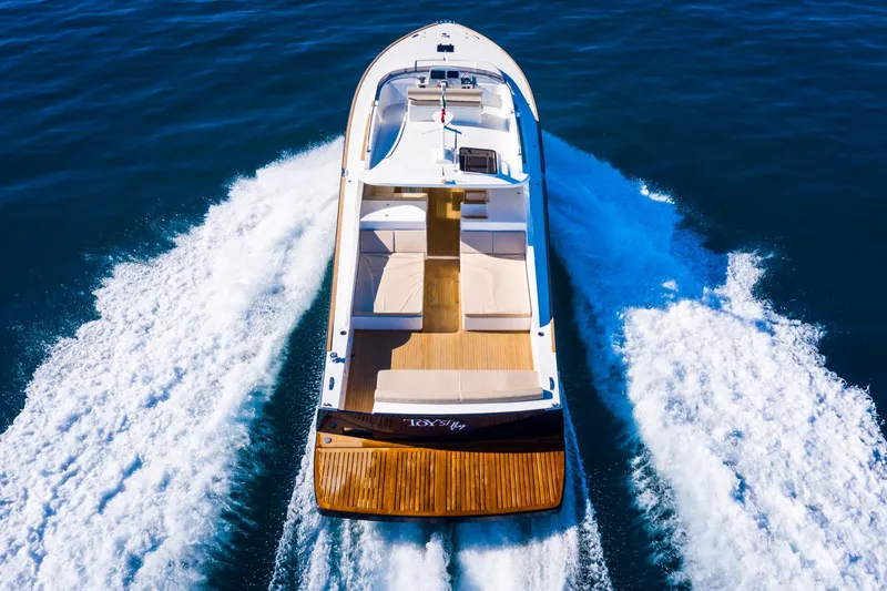 51 Fly Yacht Photos Pics Luxurious 2025 Toy 51 Fly yacht cruising on open water, showcasing sleek design and elegance.