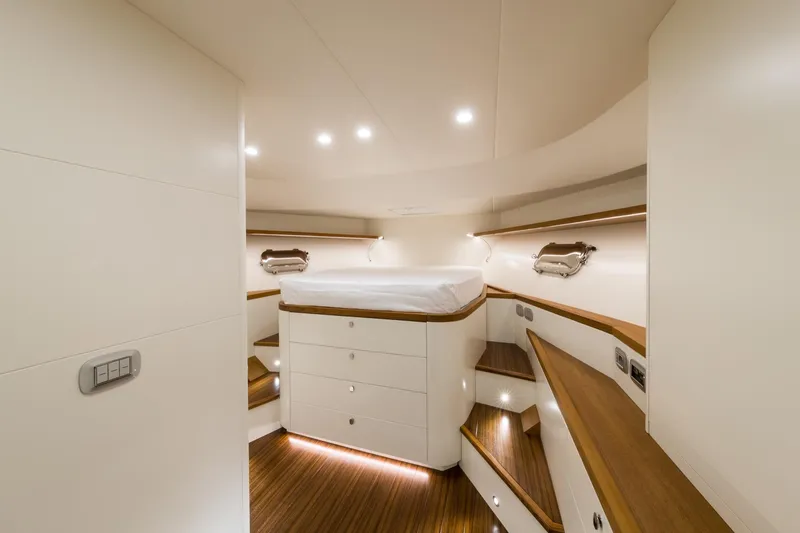 51 Fly Yacht Photos Pics Luxurious cabin interior of 2025 Toy 51 Fly yacht with modern lighting and wood accents.