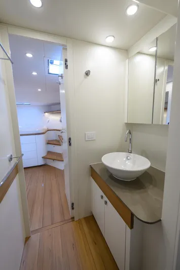 51 Fly Yacht Photos Pics Modern bathroom interior on 2025 Toy 51 Fly yacht, featuring sleek design and elegant fixtures.