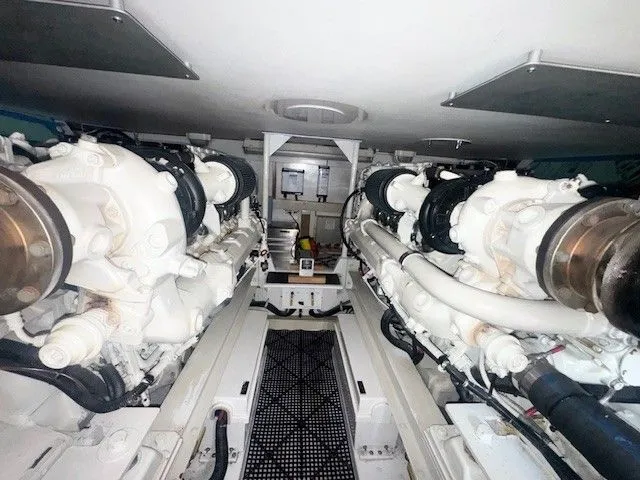 Slab Daddy Yacht Photos Pics Engine room of a 2000 Viking 50 Convertible with two large engines.