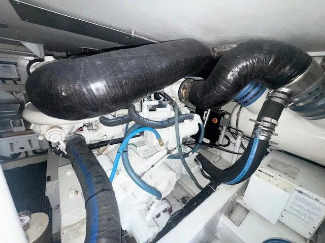 Slab Daddy Yacht Photos Pics Engine room of a 2000 Viking 50 Convertible.