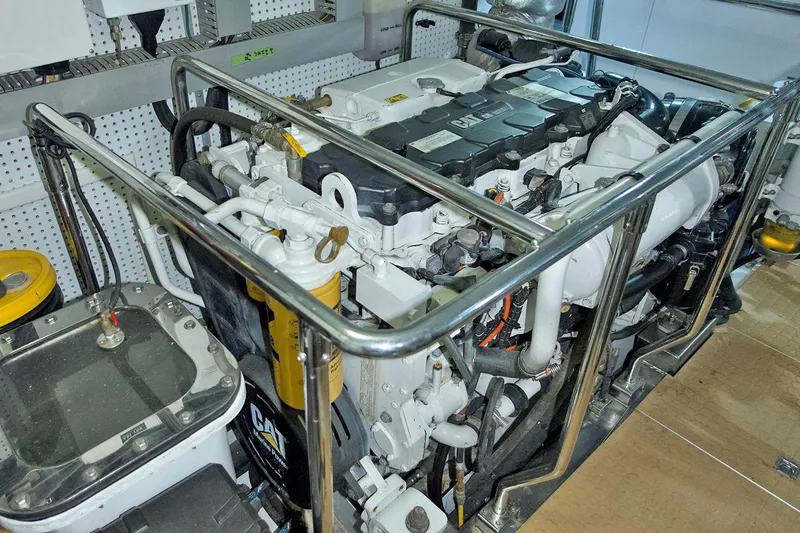 Bravo! Yacht Photos Pics Engine room of 2012 Outer Reef Yachts 700 Motoryacht with visible machinery and components.