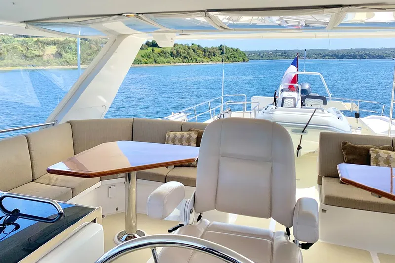 Bravo! Yacht Photos Pics Luxurious 2012 Outer Reef Yachts 700 Motoryacht interior with scenic ocean view.