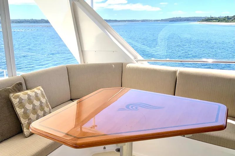 Bravo! Yacht Photos Pics Luxurious seating area on 2012 Outer Reef Yachts 700 Motoryacht with ocean view.
