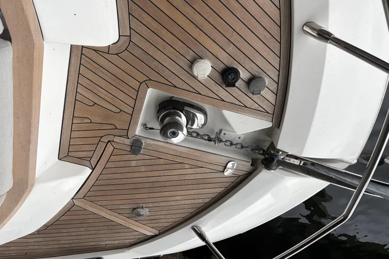 Fire Sale! Yacht Photos Pics Teak deck of 2020 Azimut 55 yacht with anchor chain and fittings.