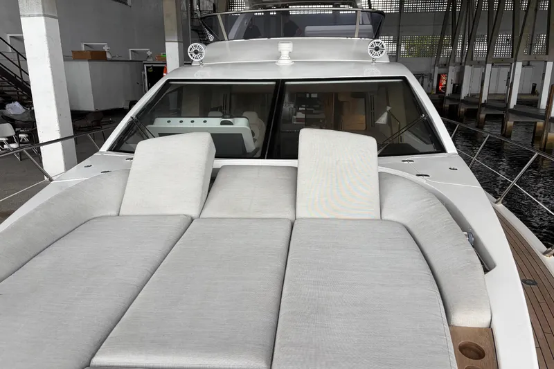 Fire Sale! Yacht Photos Pics 2020 Azimut 55 yacht with luxurious sunbathing area and sleek design.