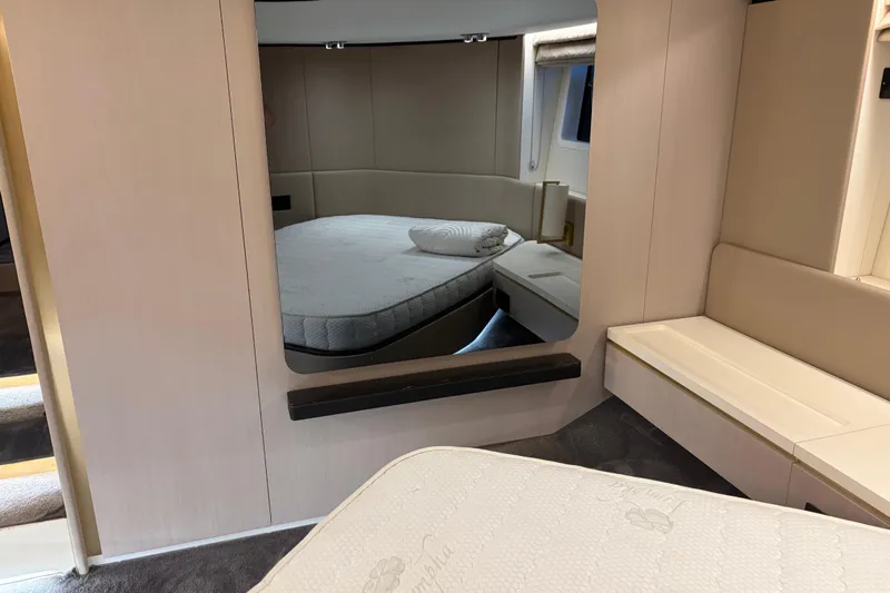 Fire Sale! Yacht Photos Pics Luxurious interior of 2020 Azimut 55 yacht with elegant bedroom design.