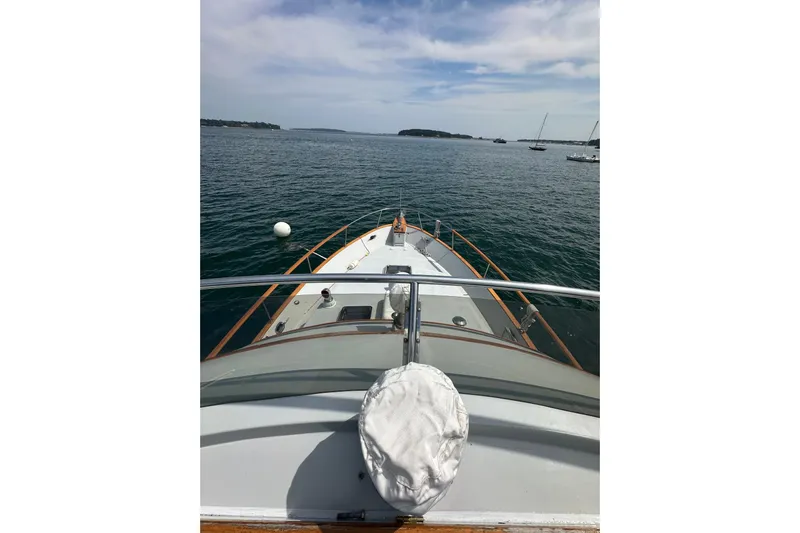  Yacht Photos Pics 1987 Albin North Sea Trawler on calm waters, view from the bow.