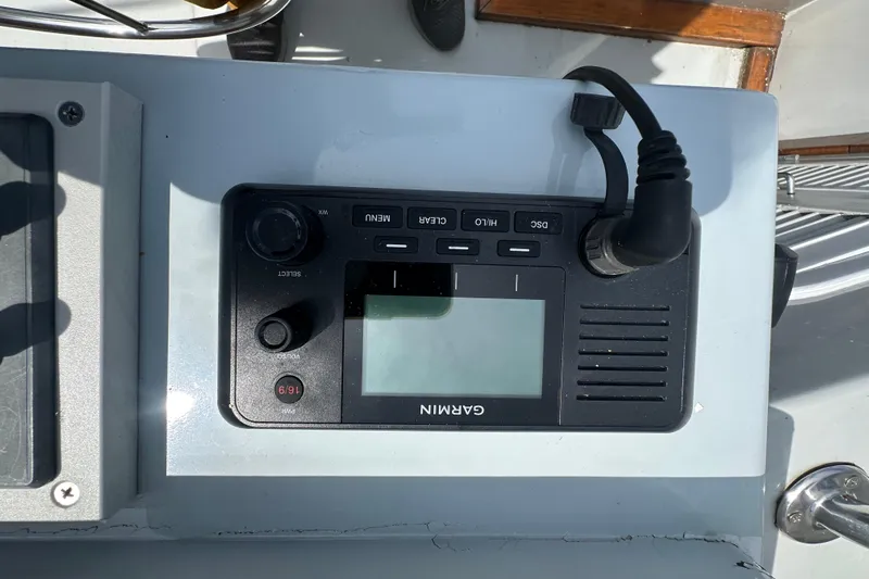  Yacht Photos Pics Garmin marine radio on 1987 Albin North Sea Trawler dashboard.