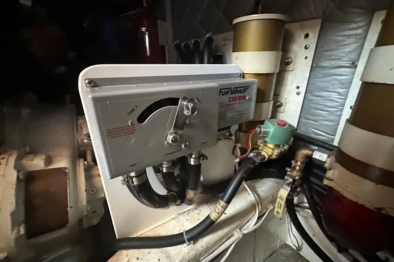  Yacht Photos Pics Engine room of 1987 Albin North Sea Trawler with fuel valve system.