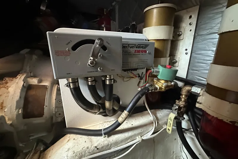  Yacht Photos Pics Engine room of 1987 Albin North Sea Trawler with fuel valve system.