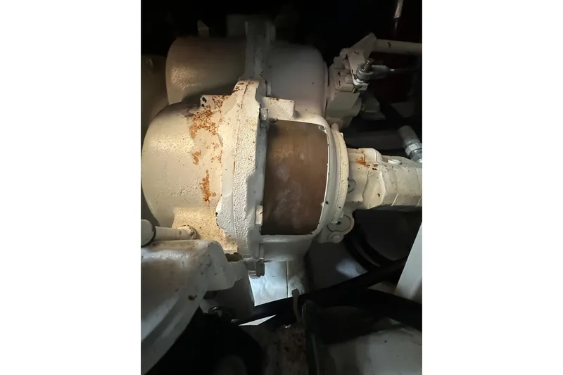  Yacht Photos Pics Engine component of a 1987 Albin North Sea Trawler, showing rust and wear.