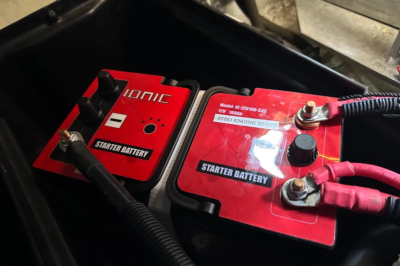  Yacht Photos Pics Starter battery setup in 1987 Albin North Sea Trawler, featuring Ionic 12V 100Ah model.