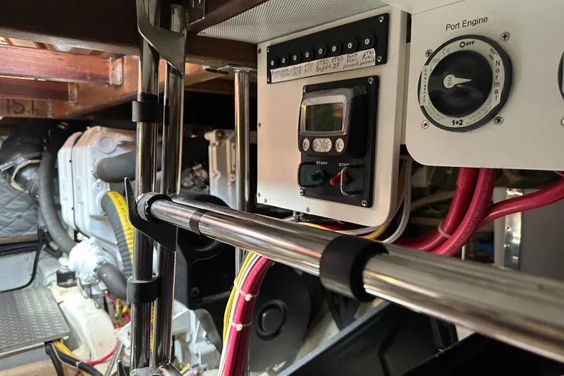  Yacht Photos Pics Engine room of 1987 Albin North Sea Trawler with control panel and wiring.