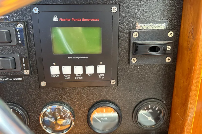  Yacht Photos Pics Control panel of a 1987 Albin North Sea Trawler with Fischer Panda generator display.