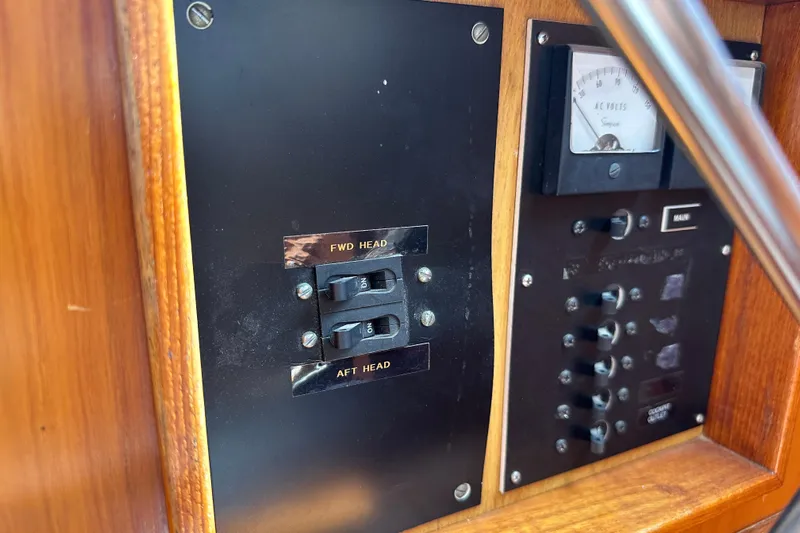  Yacht Photos Pics Control panel of a 1987 Albin North Sea Trawler with switches and voltmeter.