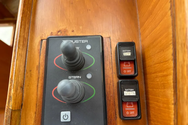  Yacht Photos Pics Control panel of a 1987 Albin North Sea Trawler with switches and joysticks.