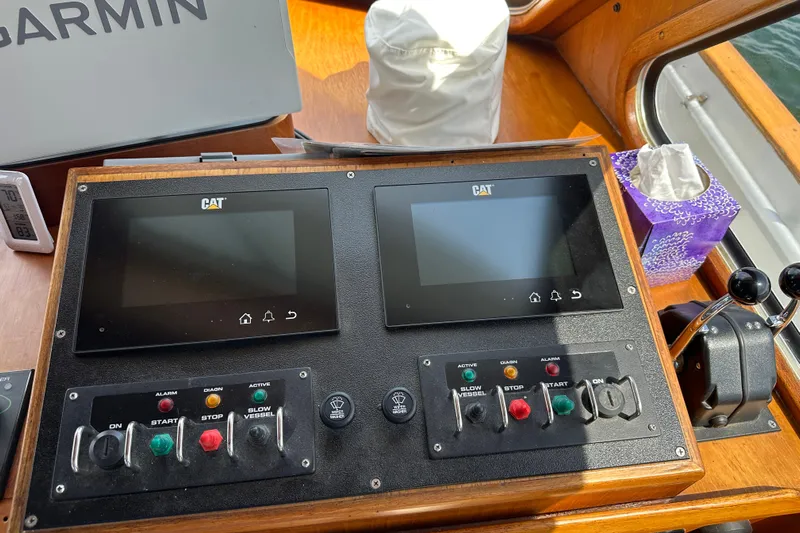  Yacht Photos Pics Control panel of a 1987 Albin North Sea Trawler with CAT displays and switches.