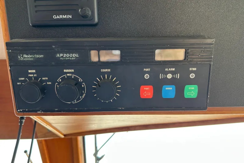  Yacht Photos Pics Control panel of 1987 Albin North Sea Trawler with Robertson AP200DL autopilot system.