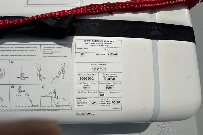  Yacht Photos Pics Safety instructions on a 1987 Albin North Sea Trawler equipment with red strap.
